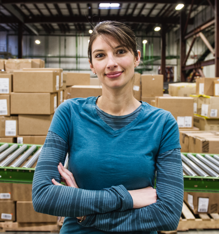 a-caucasian-female-warehouse-worker-in-a-distribut-AC-4@2x